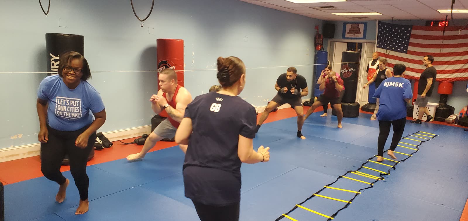 Adult fitness kickboxing class at ASDFC