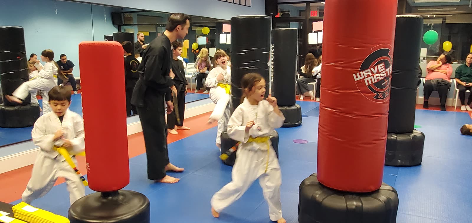 Kids martial arts class in action at ASDFC